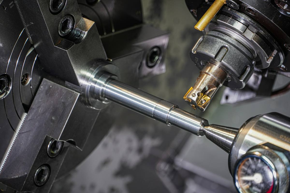 Manufacturing sourcing agent checking part dimensions and tolerances against the drawing, line by line