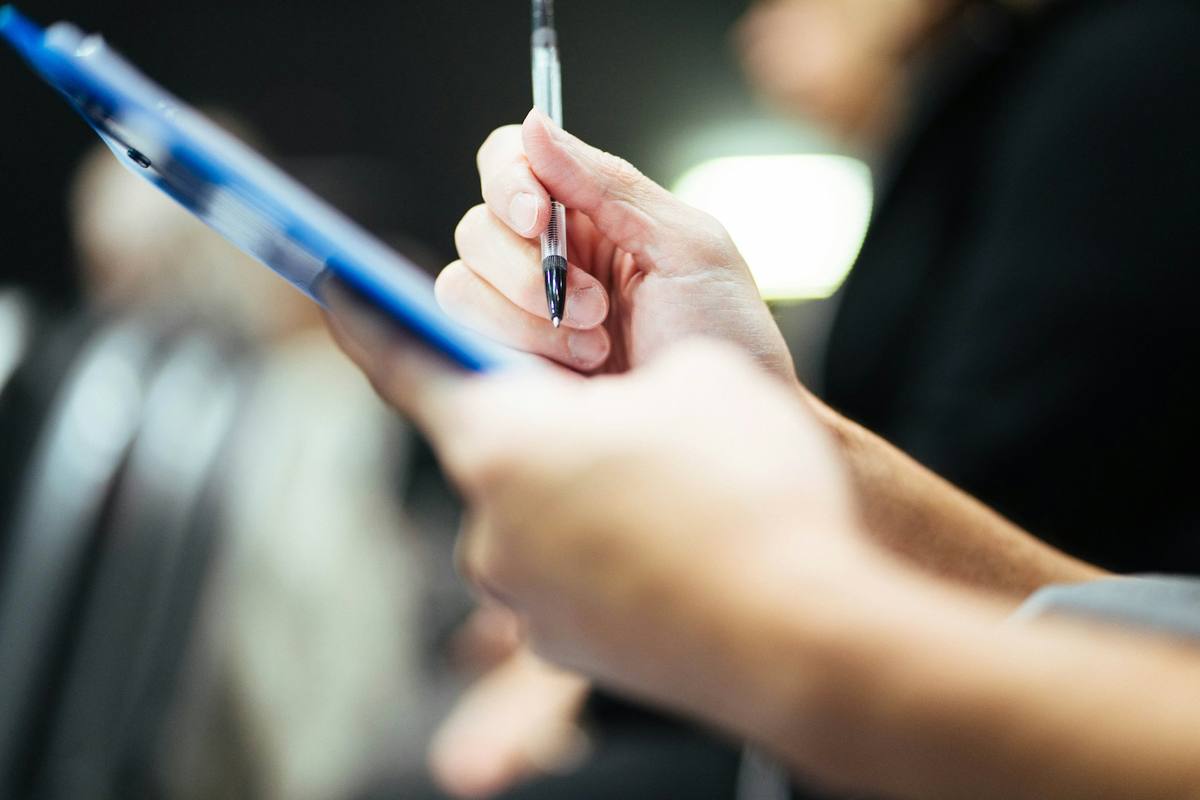 Checking production records item by item during a factory audit