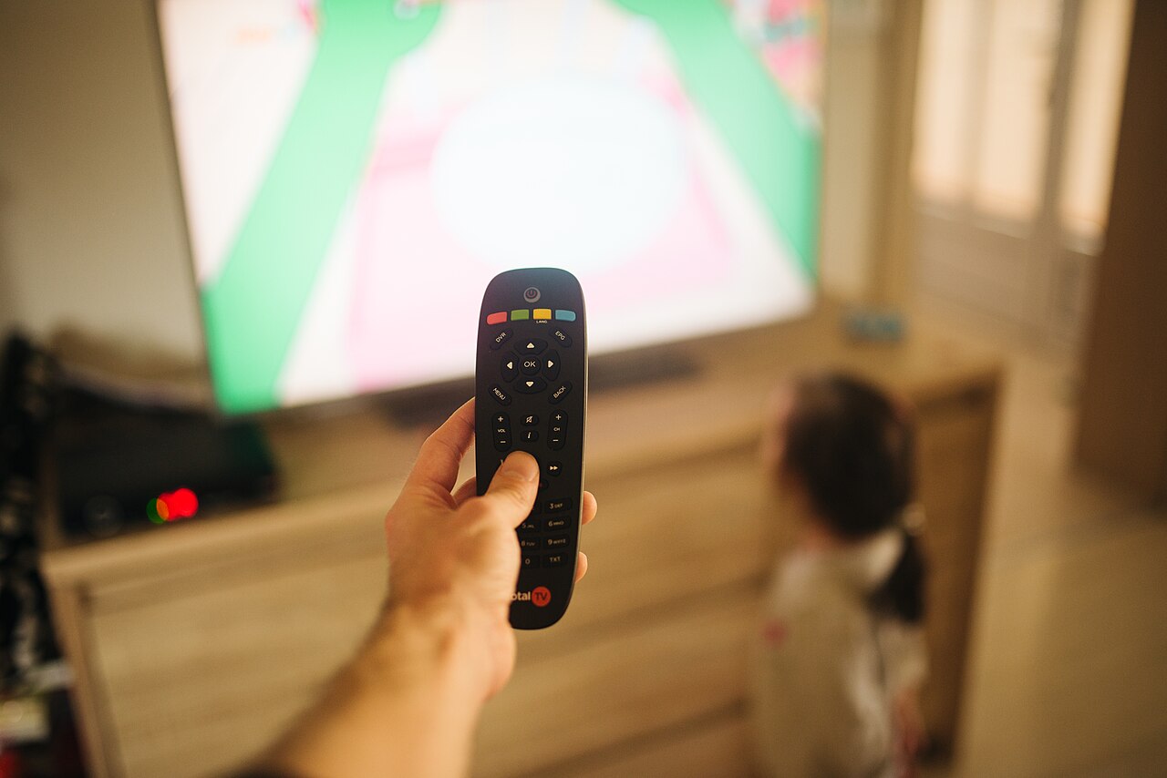 In-room television and remote — the guest-facing end of the hotel IPTV system