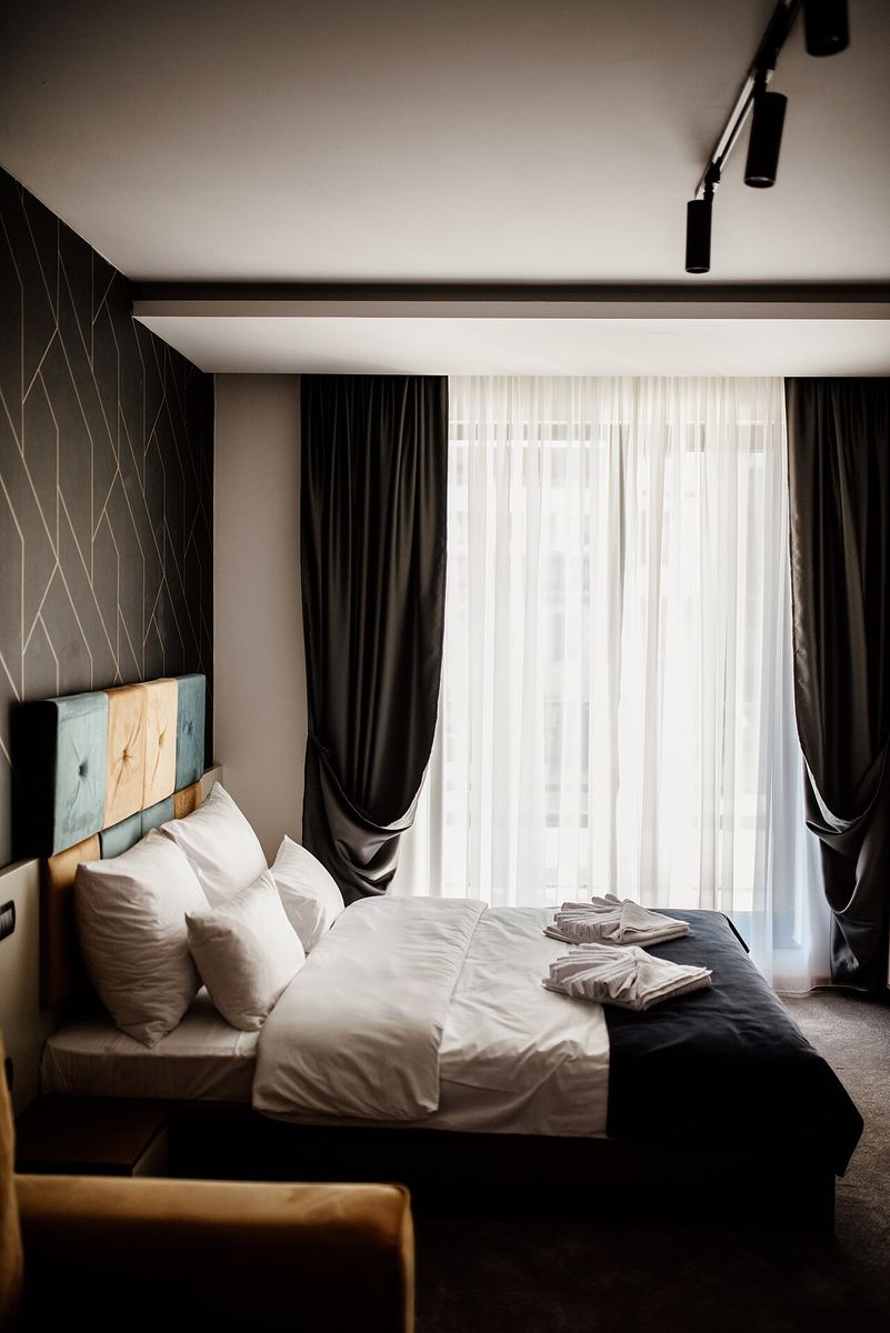 Modern hotel room — where Wi-Fi, lighting control, TV and telephony come together